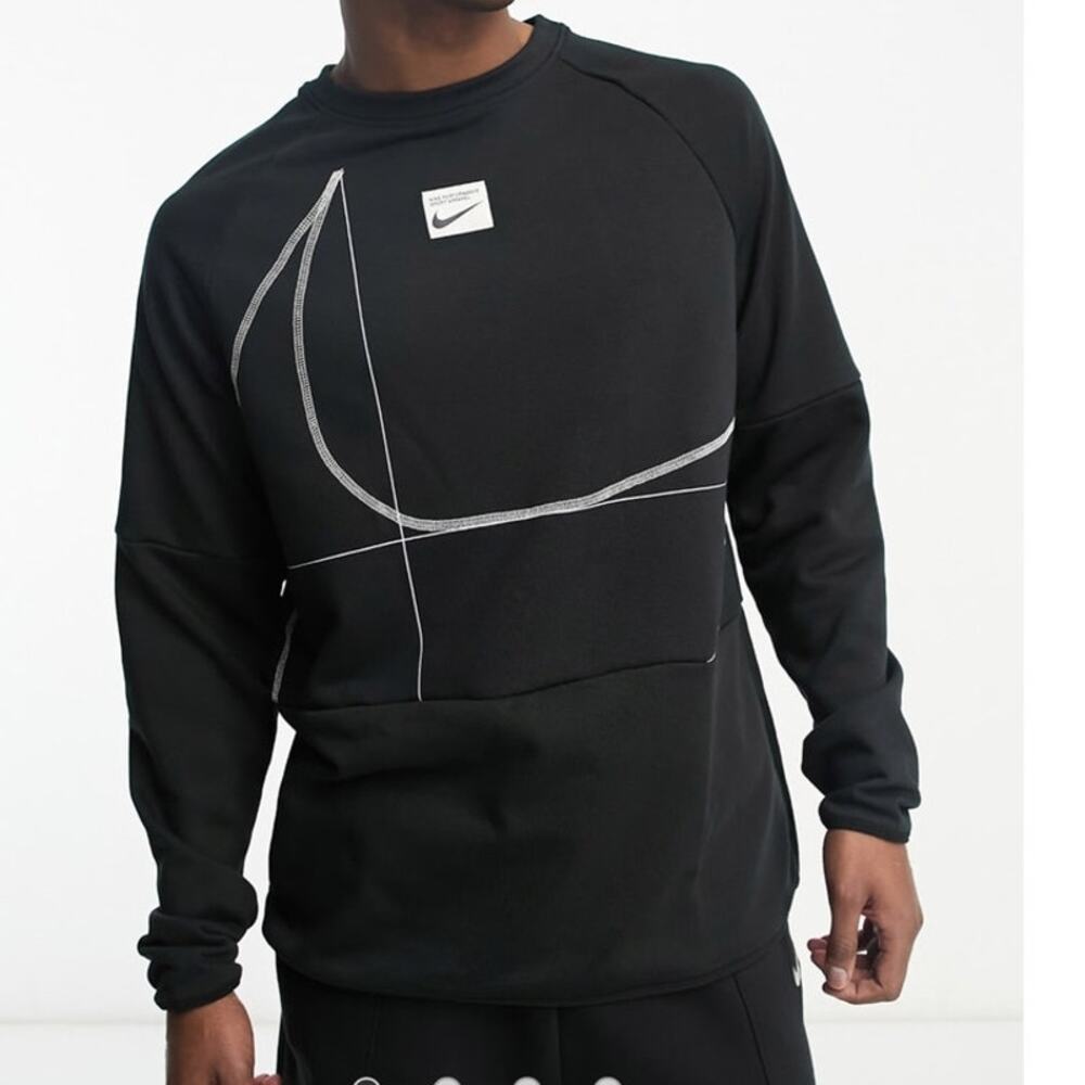 Nike Training Dri-FIT Swoosh Logo long sleeve t-shirt in black.